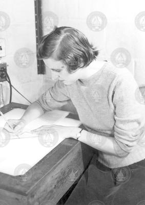 Mary Hunt working at a desk.