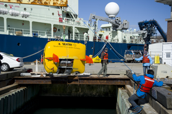 AUV Sentry is launched at the WHOI dock during tests.