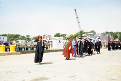 MIT-WHOI Joint Program Commencement processional along the WHOI dock.