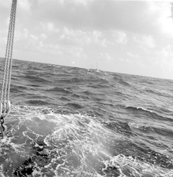 Waves and a distant ship