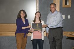 Melissa Moulton receiving the Panteleyev award from Meg Tivey and Jim Yoder.