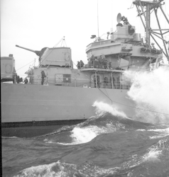 Large waves hitting the side of the USS Hazelwood