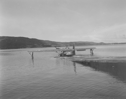 PBY aircraft leaving platform going into water