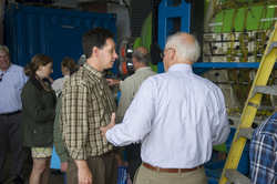 Sen. Vinny deMacedo listening to Larry Madin talk about the sub.