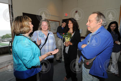 Mitzi Crane talking to Beth Ryan, Dina Pandya, and Dana Yoerger.