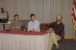 Kite-Powell, Doney, and Buesseler speaking from panel at colloquium.