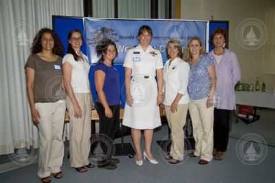 The current WHOI Women's Committee with the guest of honor.
