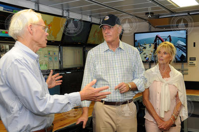 Larry Madin talking to U.S. Rep. William Keating and his wife, Tevis.