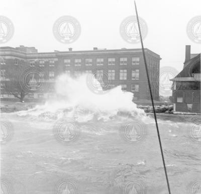 Wave crashing over seawall in Woods Hole during 1938 hurricane.