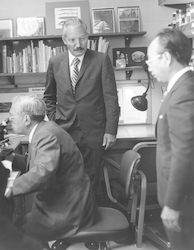 Visiting Emperor Hirohito at microscope with Howard Sanders and Sus Honjo.