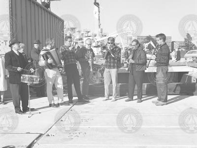 Woods Hole Chowder and Marching Society Band playing for arrival of R/V Crawford.