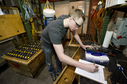 Drew McCabe working on HOV Alvin's batteries.