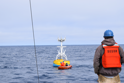 Peter Liarikos monitoring buoy maintenance operations off the Armstrong.