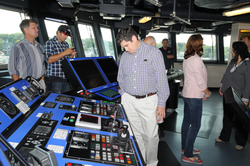 NSF associates touring the bridge on board R/V Sikuliaq.