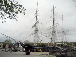 Whaling ship Charles W. Morgan at a dock in Mystic Seaport.