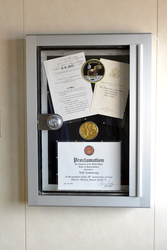 Installed Neil Armstrong congressional gold medal case.