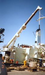 Large crane helping to load Atlantis II