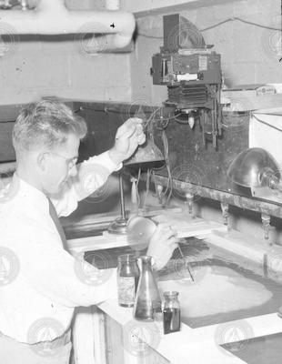 Bill von Arx with the model of Rongelap Lagoon he made in a lab flume.