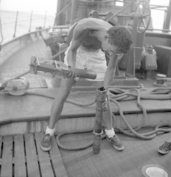 William Shultz with bathythermograph (BT) on deck of Atlantis.
