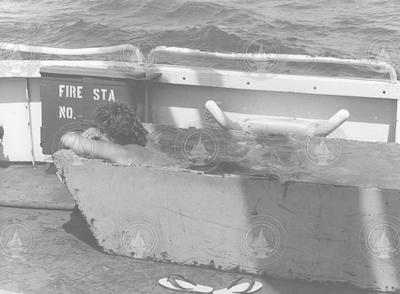 Charles Hollister cooling off aboard a ship