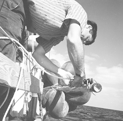 Unidentified person working with equipment on the Ocean Pearl.