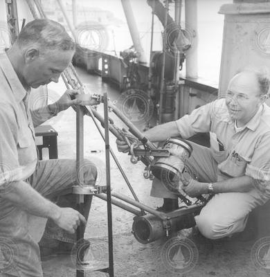 George L. Clarke (left) with Harold "Doc" Edgerton working on board R/V Chain.
