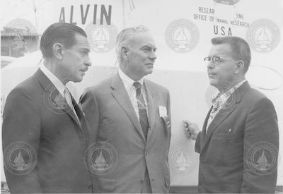 Al Vine (R) and two unidentified men standing next to Alvin