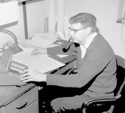 Andrew Bunker with adding machine