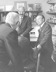Paul Fye (front left), Emperor Hirohito (seated), Howard Sanders (back), and Sus Honjo.