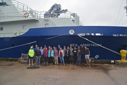 MIT-WHOI Joint Program students with R/V Neil Armstrong at the dock.