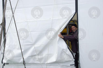 Phil Forte peeking out from Camper's tent.