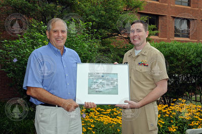 Jim Yoder presenting Tom Miller with the 2014 Richard F. Pittenger award.