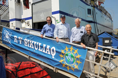 Rob Munier, Congressman Keating, Larry Madin, and Roger Wakimoto.