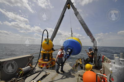 Jeff Pietro and Will Ostrom deploying ESP surface buoy.