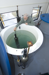 Jim Valdes testing SOLO floats in WHOI test tank facility.