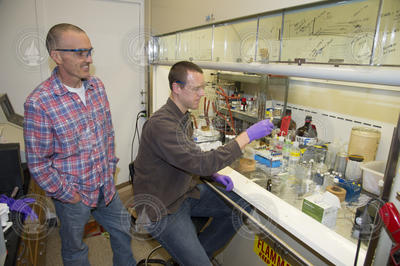 Greg O'Neil and Chris Reddy working with Isochrysis algae in Reddy's lab.