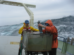 Justin Ossolinski and Ben Van Mooy working out on the stern of the Oceanus.