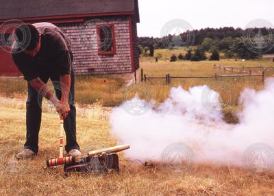 Dick Colburn firing 10-gauge cannon.