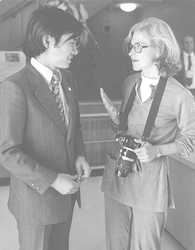 Vicky Cullen talking with Japanese delegate during Emperor Hirohito visit to WHOI.