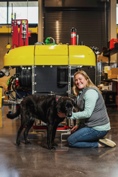 Kaitlyn Tradd with her pup Luna and AUV Mesobot.