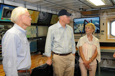 Larry Madin talking to U.S. Rep. William Keating and his wife, Tevis.