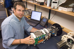 Rich Camilli in the lab with Gemini, his miniature mass spectrometer.