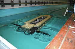Underwater vehicle Finnegan (without skin) undergoing testing in pool.