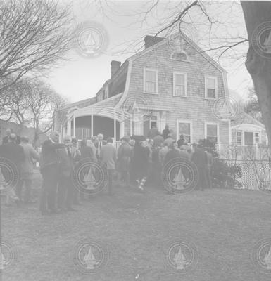 Textron Inc. visitors gathered on the lawn of director's house