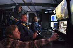 The team driving ROV Yogi from vessel Annie's blacked-out control room.