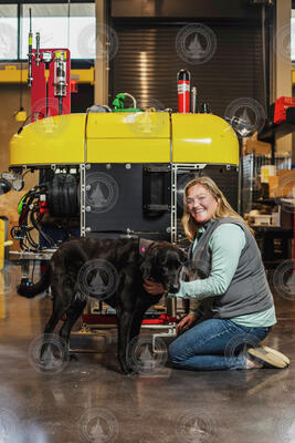 Kaitlyn Tradd with her pup Luna and AUV Mesobot.