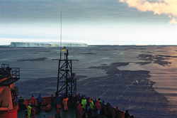 Researchers on board R/V Aurora Australis view the sunset over open Southern Ocean.