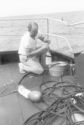 Sydney "Bud" Knott working aboard ship