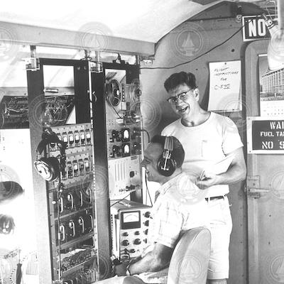 Andrew Bunker [right] and Ed Denton aboard C-54Q airplane