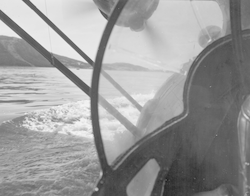 PBY landing in water, as seen looking out of aircraft